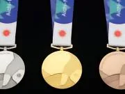 新华社:一位电竞运动员发现亚运金牌有瑕疵,连夜进行了更换